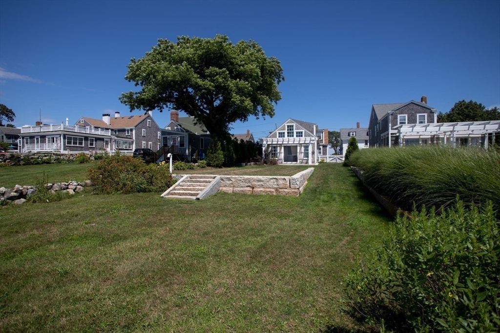 2043 Main Road Westport, MA 02791 - Photo 38 of 42 a view of a house with a big yard plants and large trees