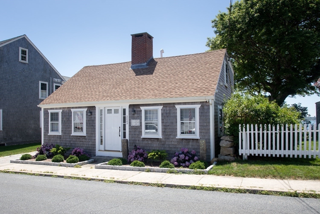 2043 Main Road Westport, MA 02791 - Photo 5 of 42 a front view of a house with garden