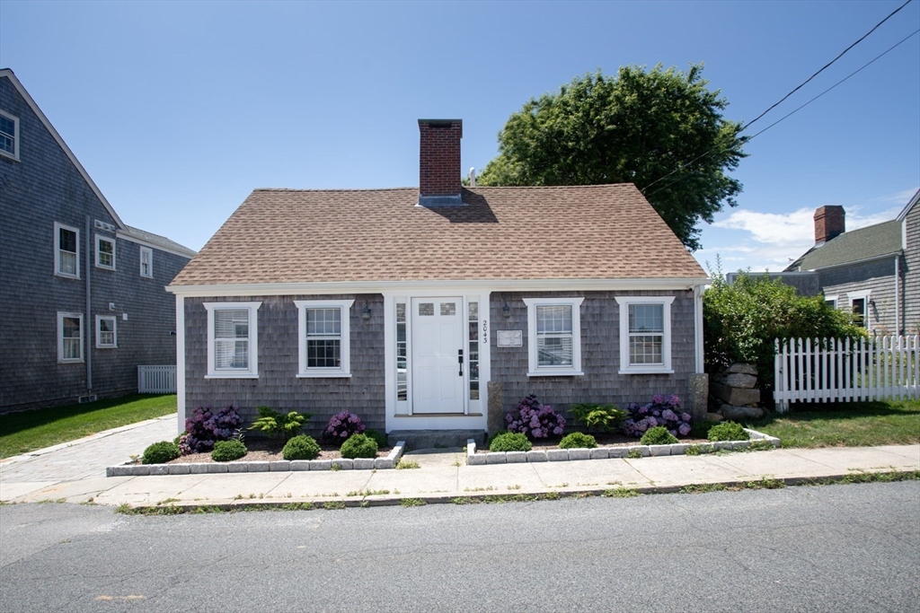 2043 Main Road Westport, MA 02791 - Photo 6 of 42 front view of a house with a yard