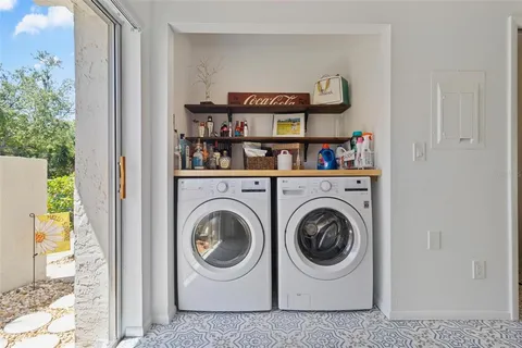 a utility room with dryer and washer