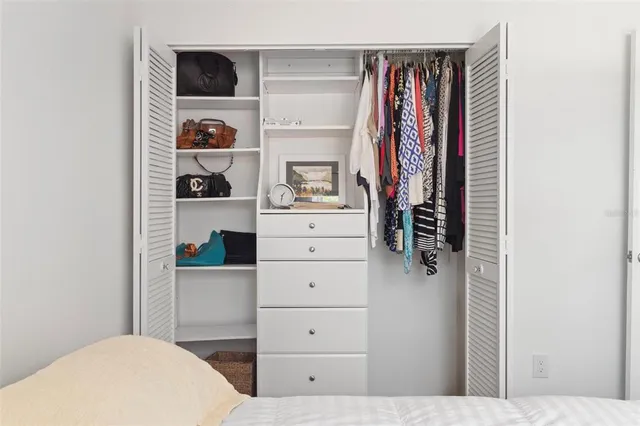 a view of a closet and storage