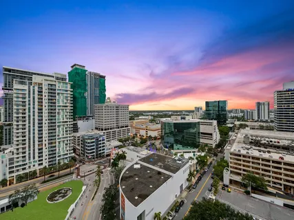 a view of a city with tall buildings