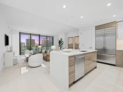 a large white room with a large window