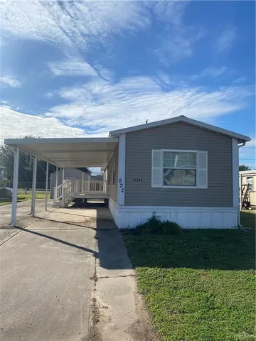 front view of house with a yard