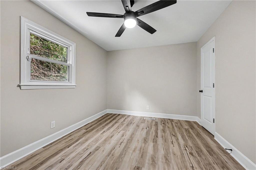 8145 Spotswood Road Summerfield, NC 27358 - Photo 11 of 36 massive primary bedroom with fireplace