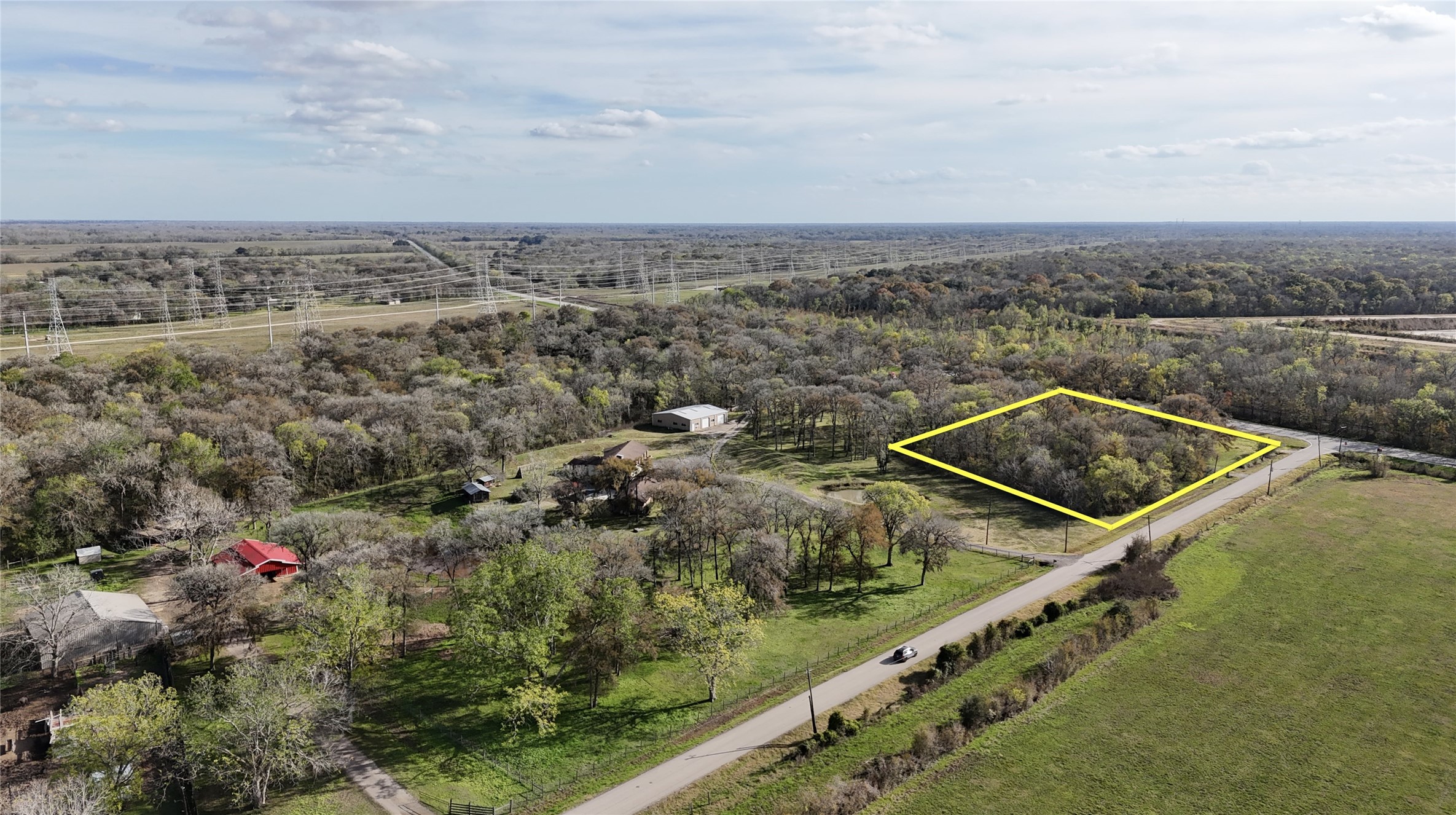 2759 FM 2759 Road Richmond, TX 77469 - Photo 3 of 6 an aerial view of a residential apartment building with a yard