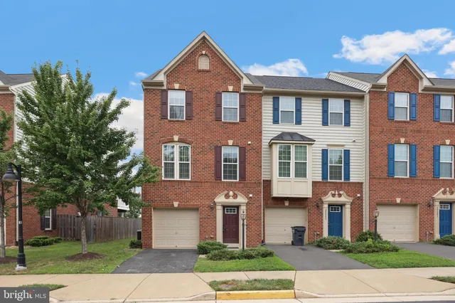 a view of outdoor space with playground and green space
