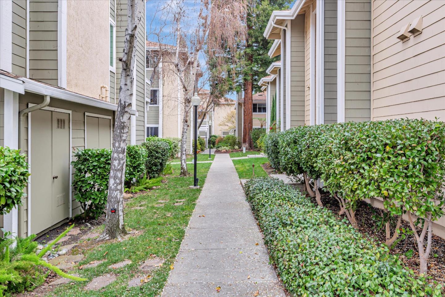 2575 Oak Road, Unit B Walnut Creek, CA 94597 - Photo 18 of 20 a view of a pathway with house on both side