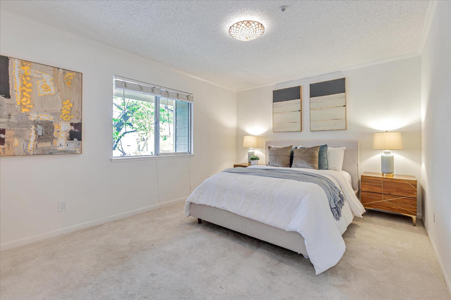 2575 Oak Road, Unit B Walnut Creek, CA 94597 - Photo 10 of 20 a bedroom with a bed and a large window
