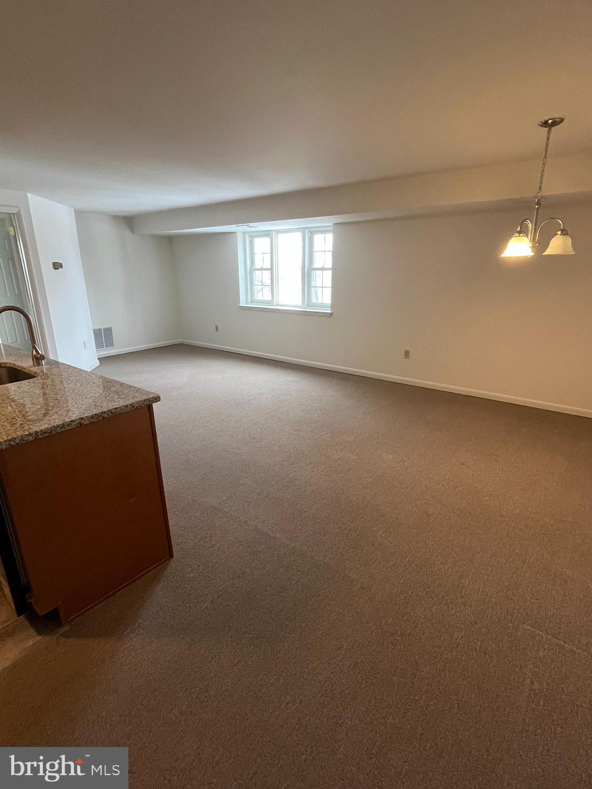 643 Main Street, Unit C3 Pennsburg, PA 18073 - Photo 6 of 11 a view of a livingroom with a window