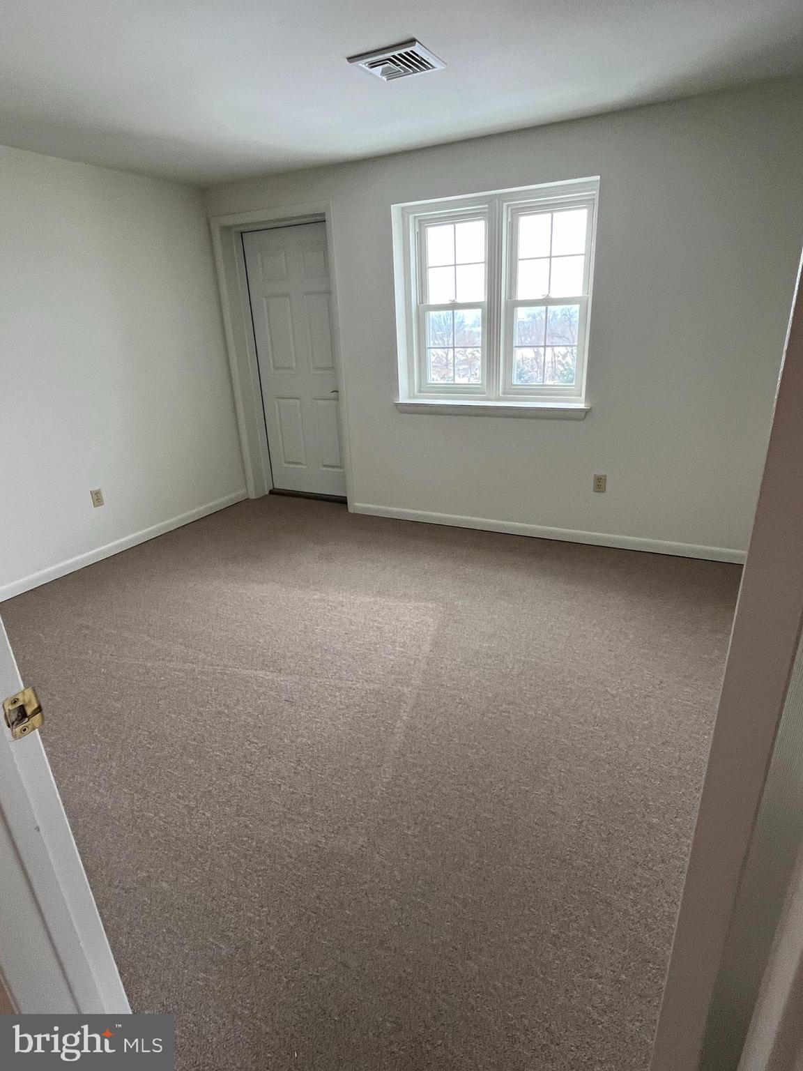643 Main Street, Unit C3 Pennsburg, PA 18073 - Photo 7 of 11 an empty room with a window