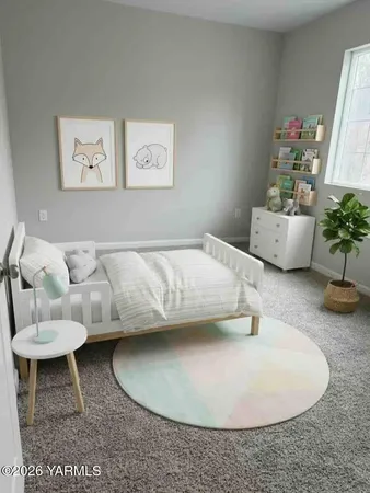 a workspace with furniture and window