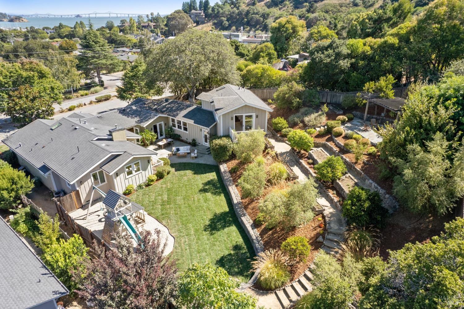 an aerial view of a house with a garden