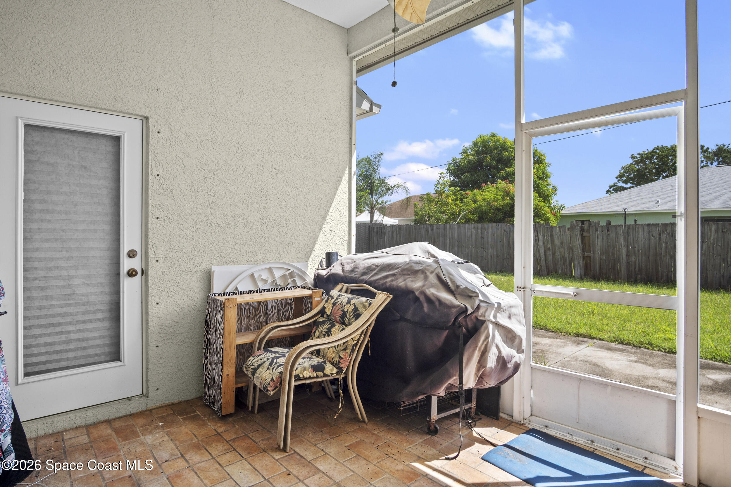 463 Avocado Road Northwest Palm Bay, FL 32907 - Photo 25 of 34 Screened porch