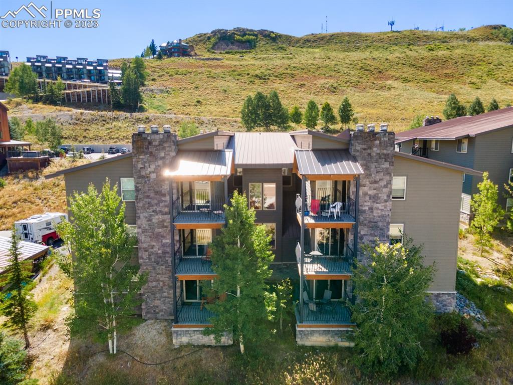 651 Gothic Road, Unit 301 Crested Butte, CO 81225 - Photo 6 of 24 an aerial view of houses with a lake