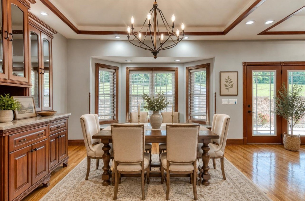 315 Blue And Gray Park Road Elkton, KY 42220 - Photo 62 of 66 a view of a dining room with furniture window and wooden floor