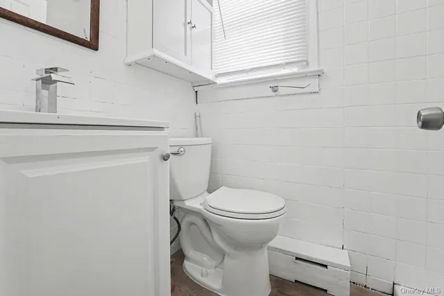 a bathroom with a sink and toilet