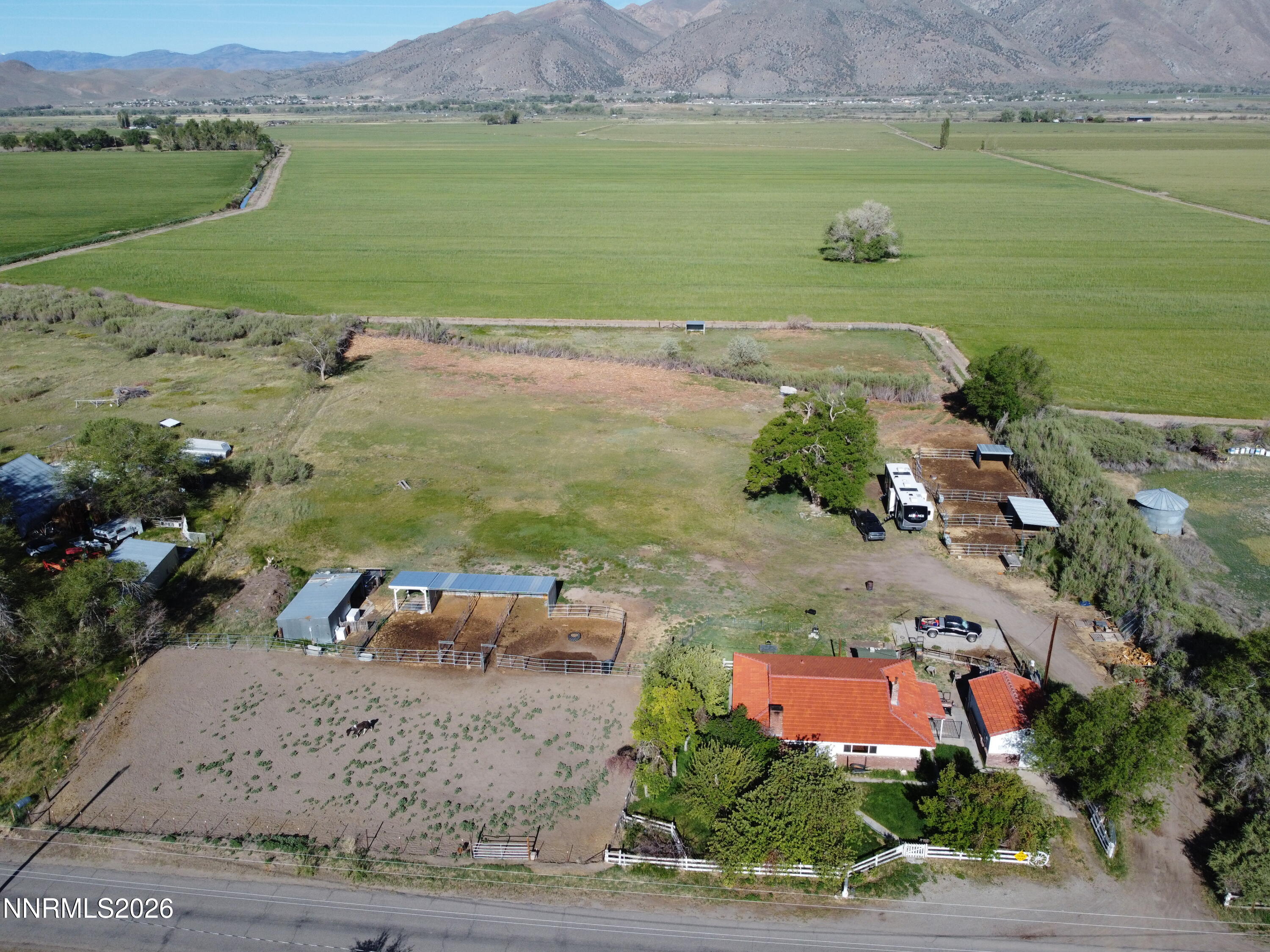 61 Rivers Road Smith, NV 89430 - Photo 10 of 57 an aerial view of a house with a garden and lake view