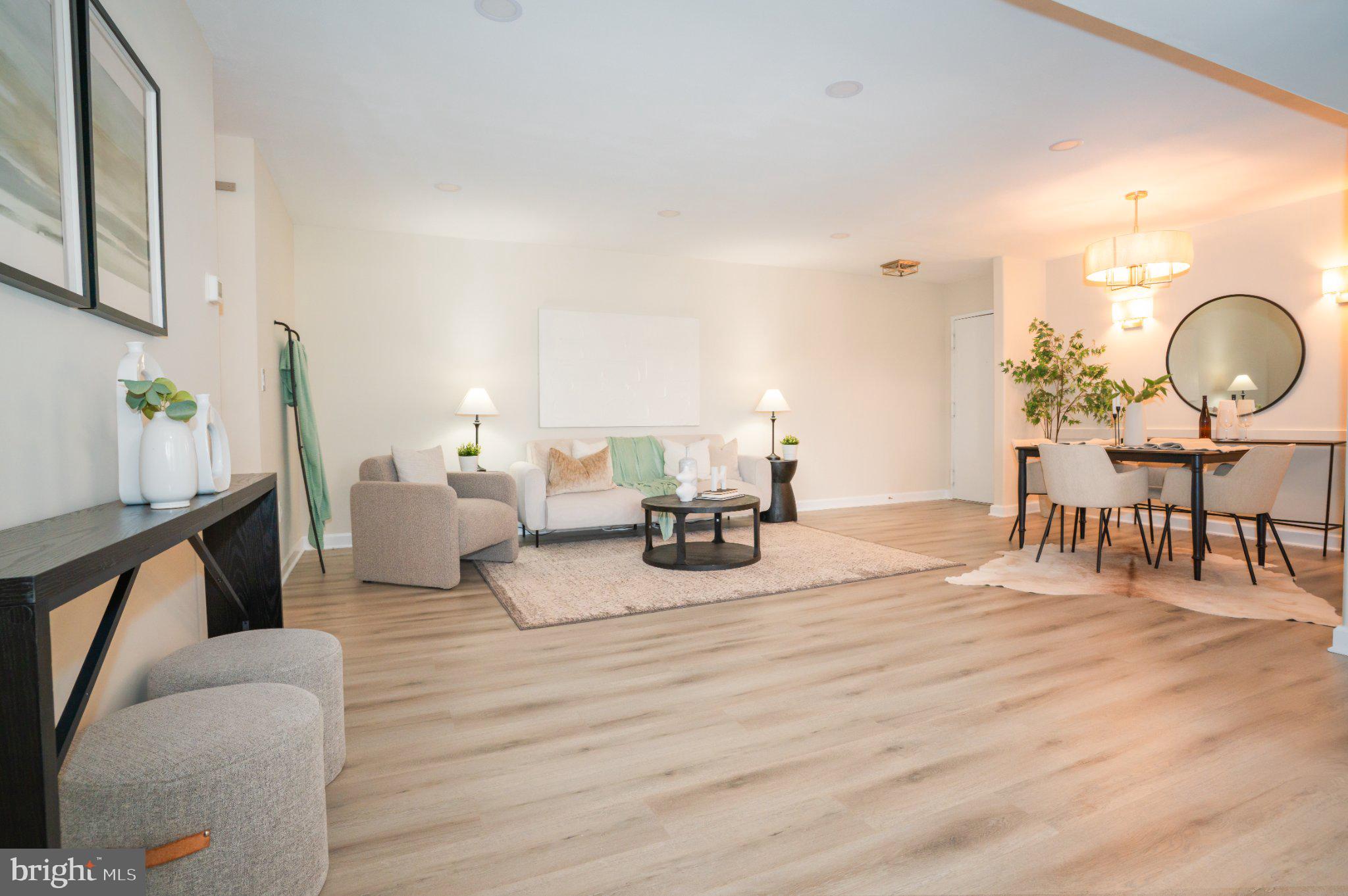 5860 Thunder Hill Road, Unit C1 Columbia, MD 21045 - Photo 3 of 22 Bright and airy modern living space.
