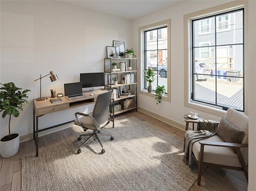 909 Rickenbach Street Pittsburgh, PA 15212 - Photo 10 of 23 a workspace with furniture and a window