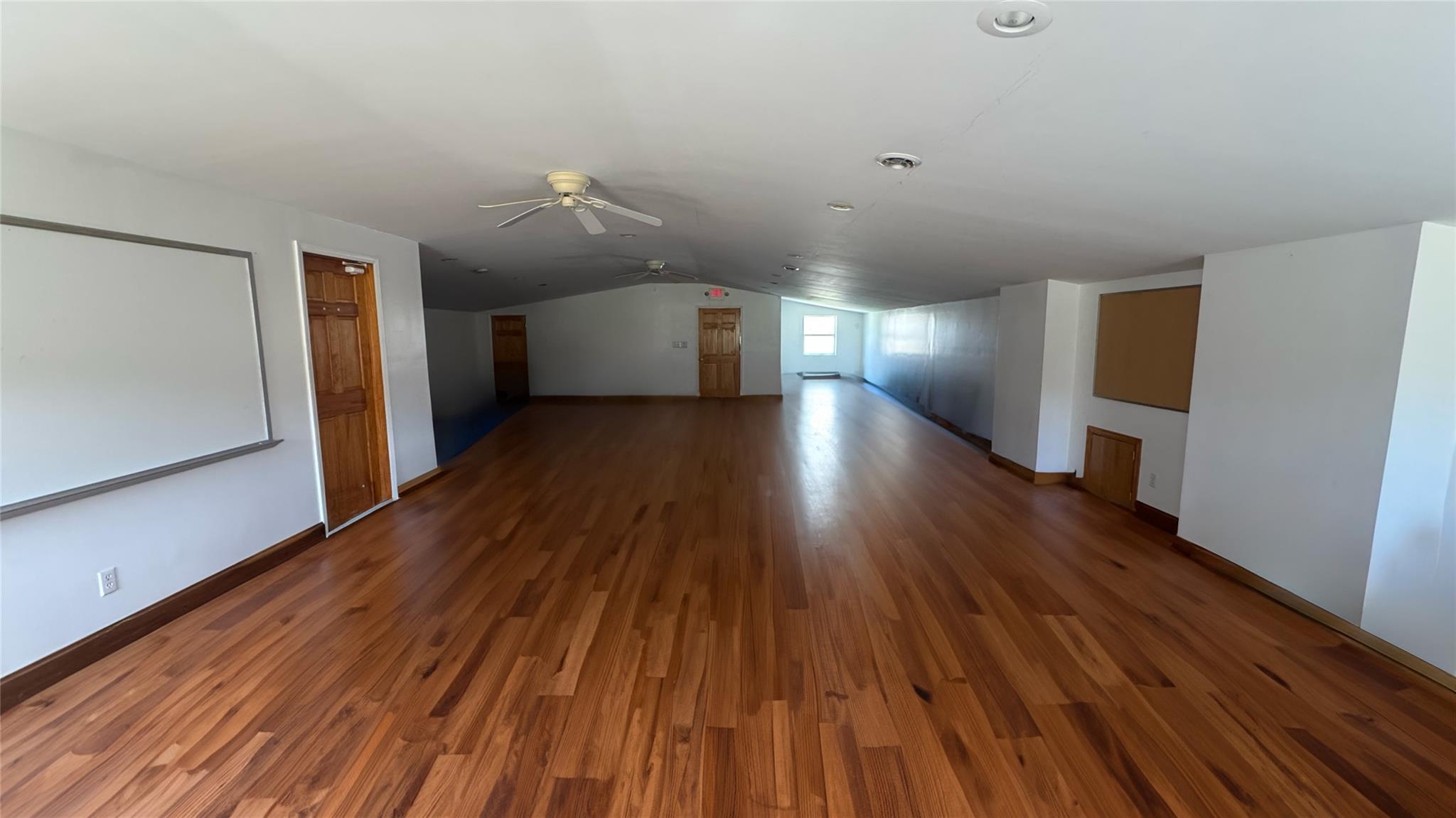 892 Bowbell Road Greene, NY 13778 - Photo 20 of 35 wooden floor in an empty room with a window