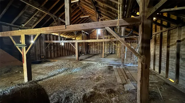 a view of a kitchen with a sink dishwasher and a microwave oven