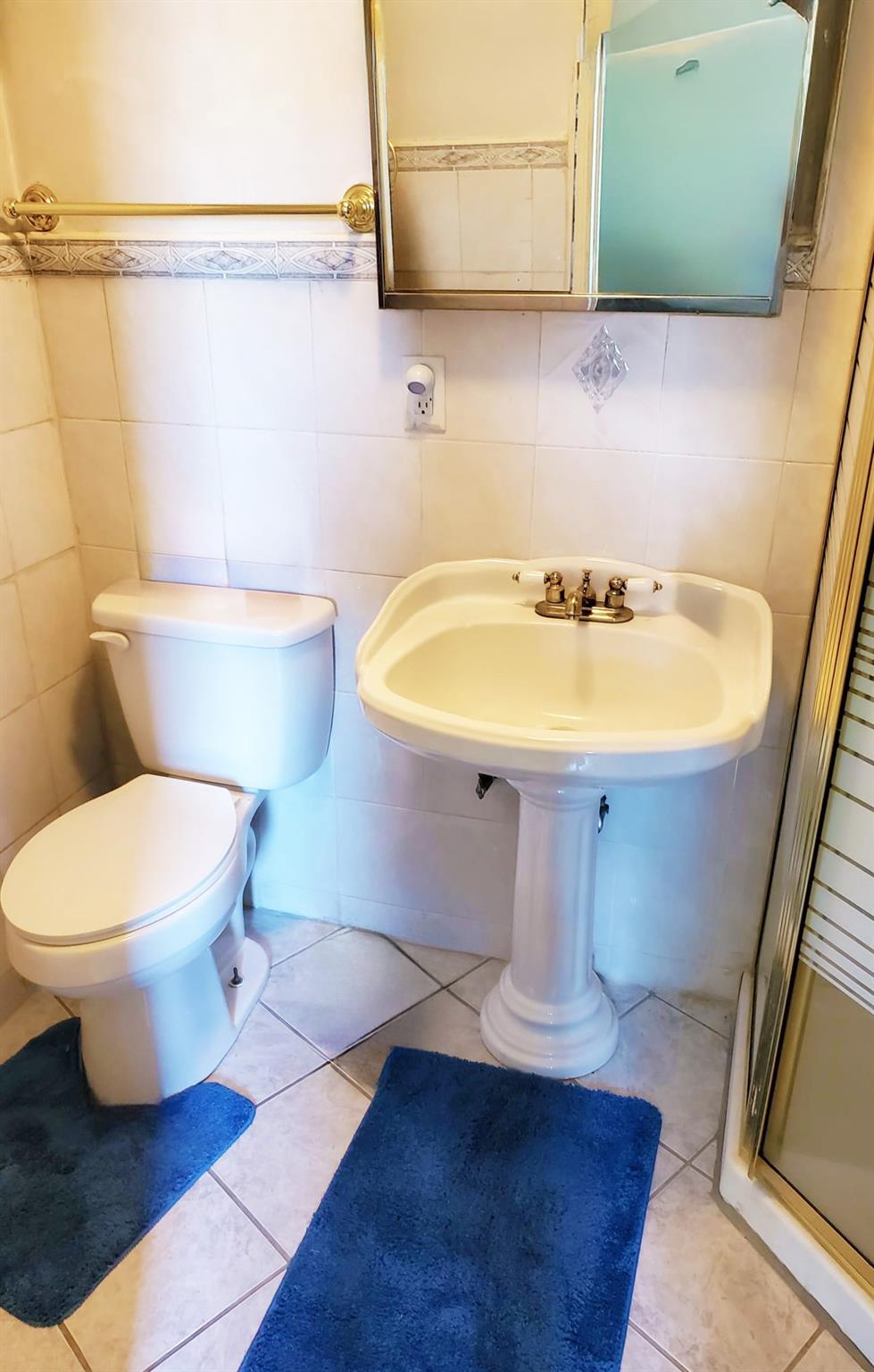 892 Bowbell Road Greene, NY 13778 - Photo 4 of 35 a bathroom with a sink and a mirror