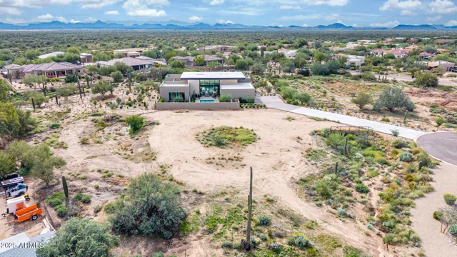 a view of a city with a building in the background
