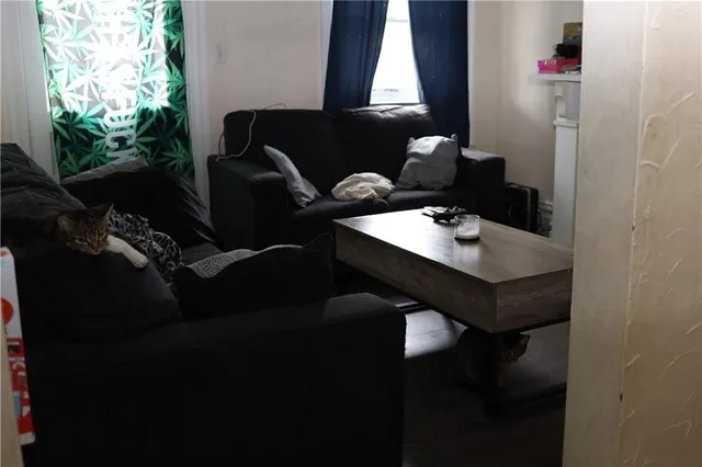 a view of entryway with wooden floor