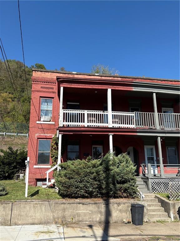 518 Middle Avenue Wilmerding, PA 15148 - Photo 3 of 37 a front view of a house with entryway