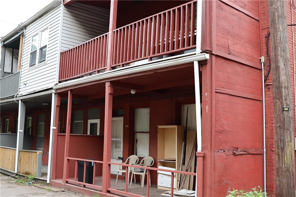 518 Middle Avenue Wilmerding, PA 15148 - Photo 7 of 37 front view of a building with a glass door