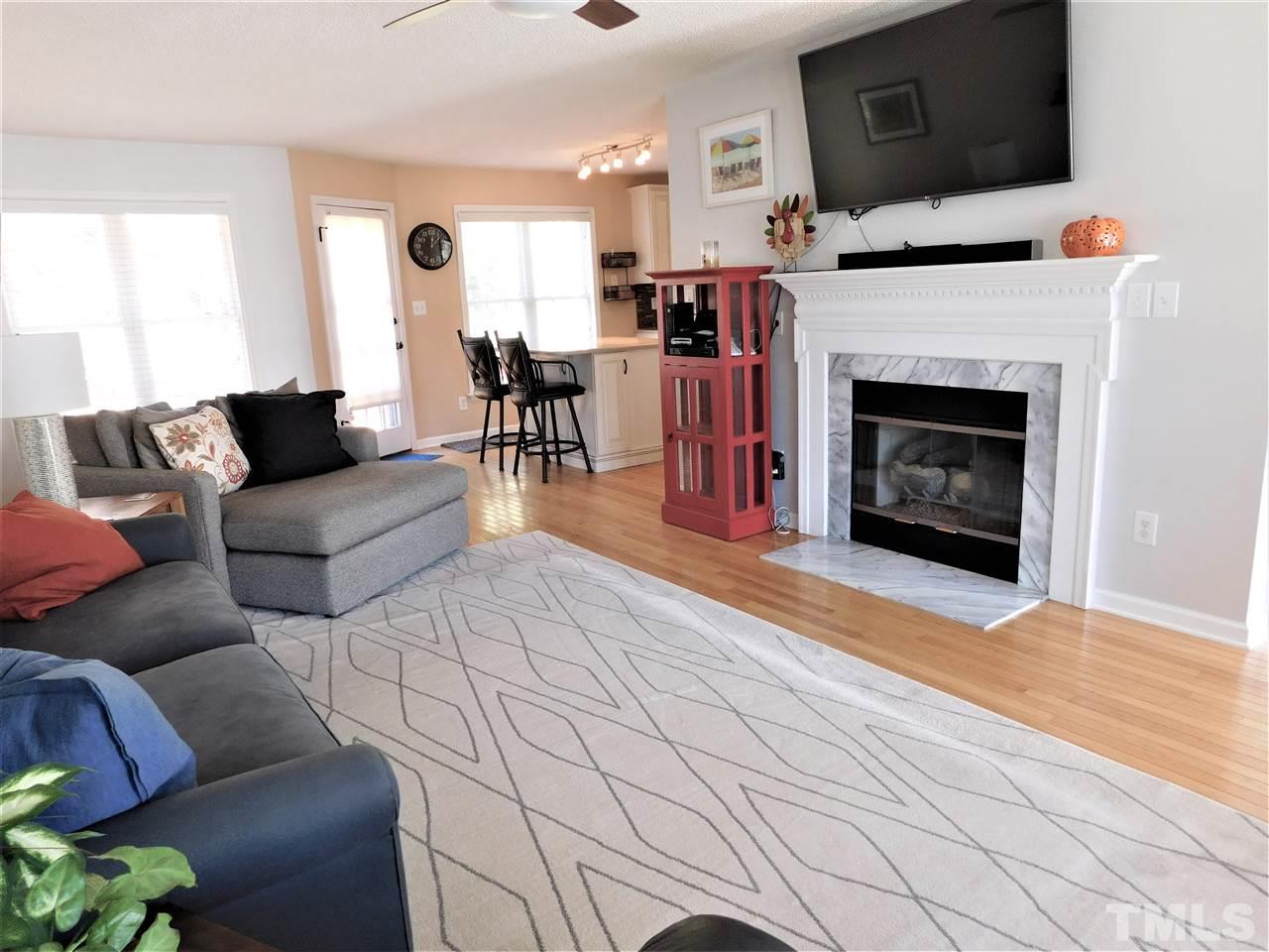 9420 Dawnshire Road Raleigh, NC 27615 - Photo 11 of 30 Warm up Next to the Fireplace!