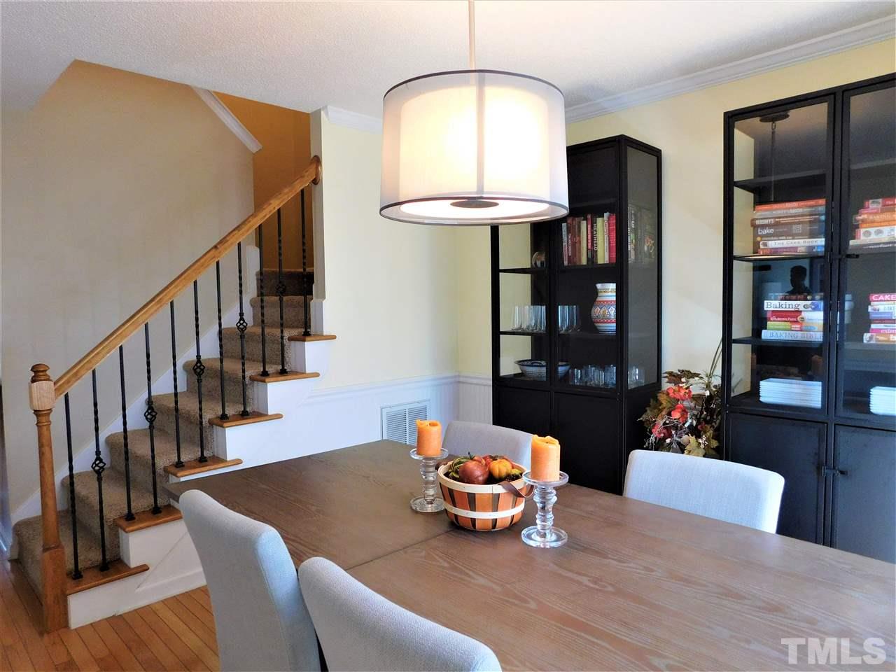 9420 Dawnshire Road Raleigh, NC 27615 - Photo 12 of 30 Dining Room Showing Metal Ballisters on Stair Railing!