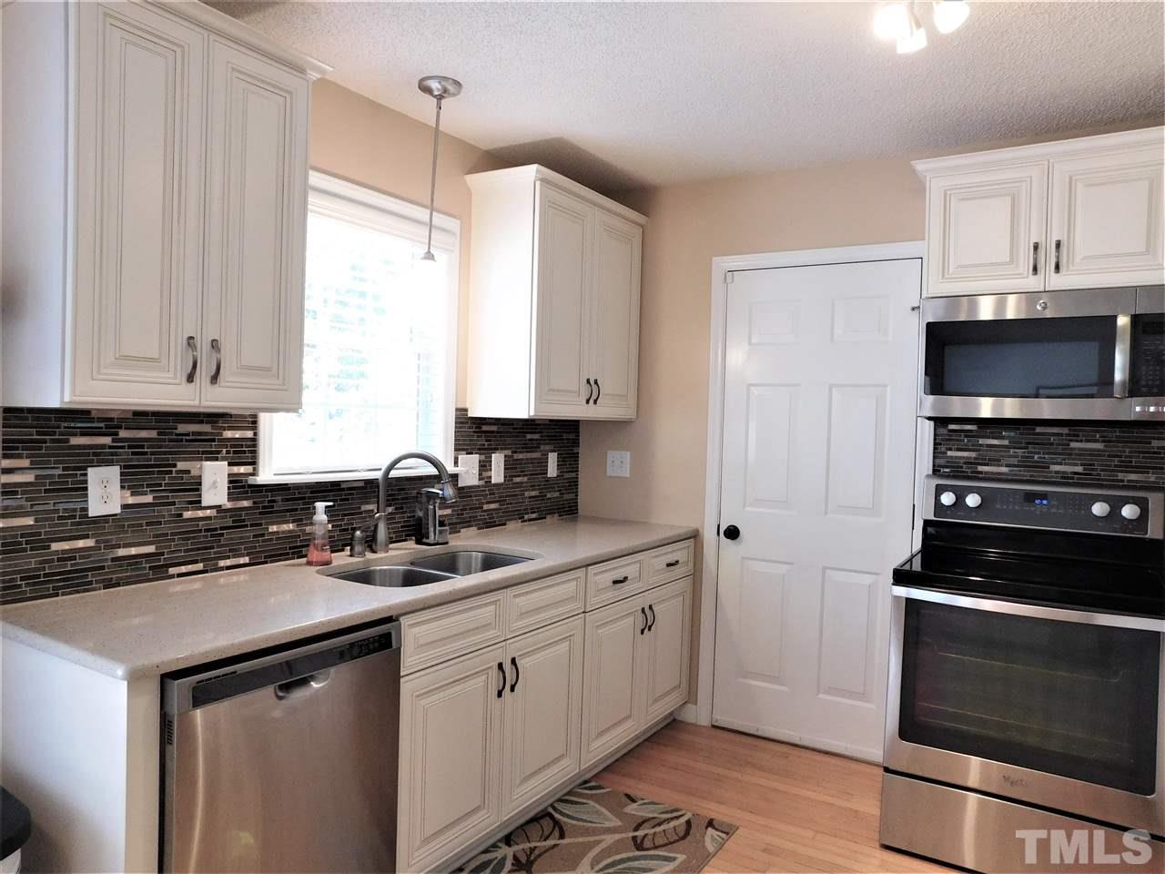 9420 Dawnshire Road Raleigh, NC 27615 - Photo 14 of 30 Kitchen Has Hardwood Flooring!