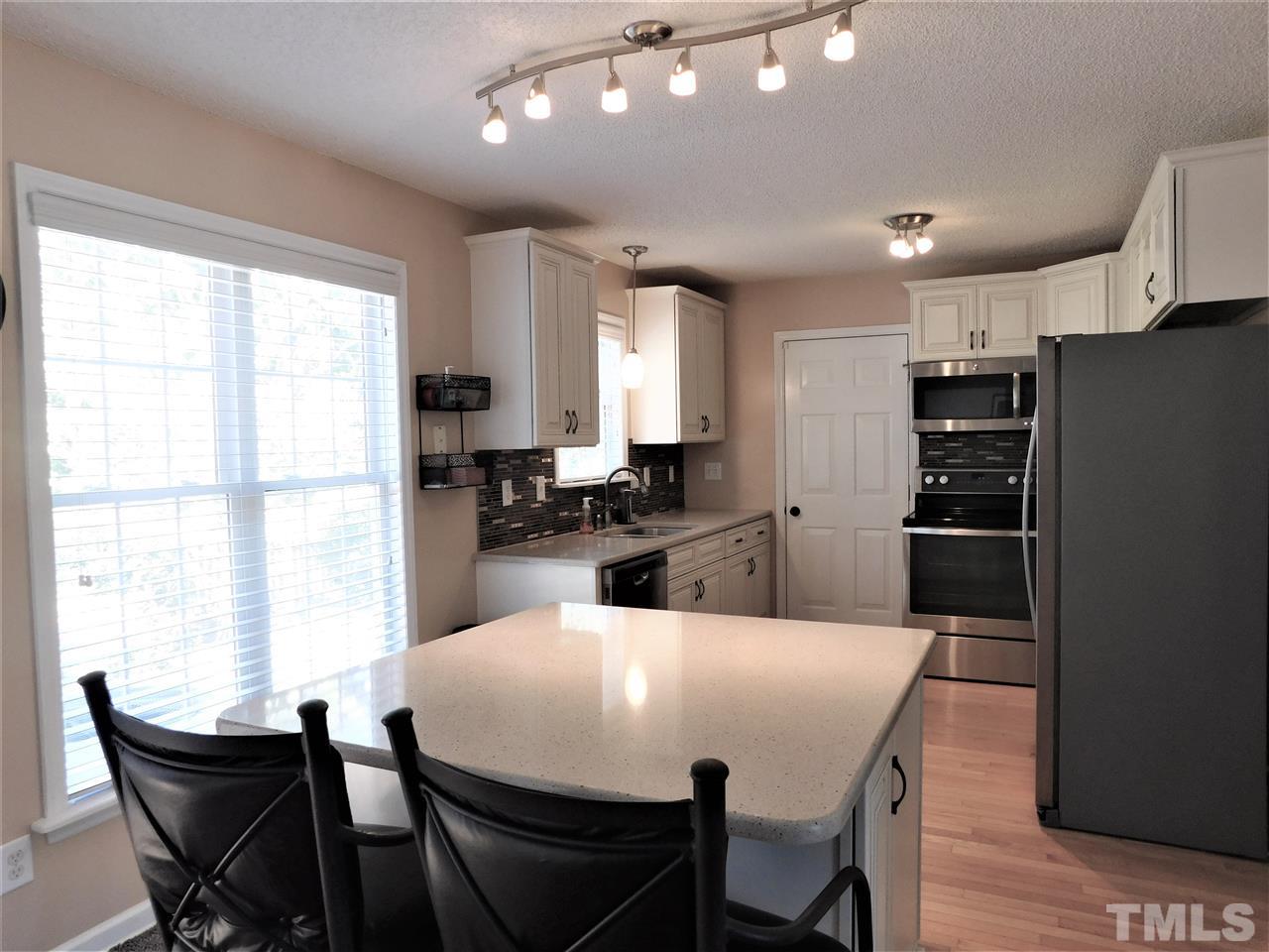 9420 Dawnshire Road Raleigh, NC 27615 - Photo 15 of 30 Island Adds SO Much Storage and Counter Space!