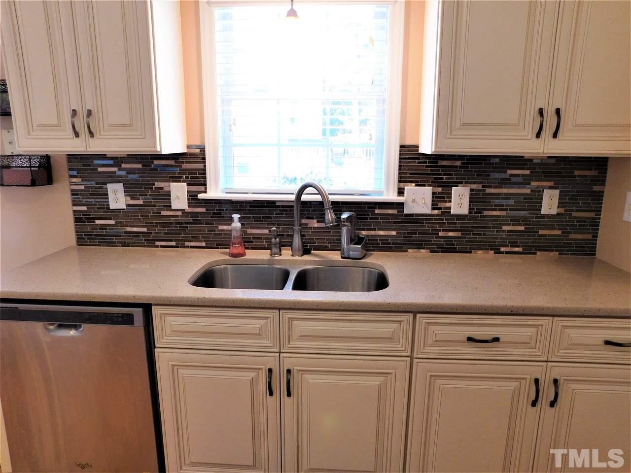 9420 Dawnshire Road Raleigh, NC 27615 - Photo 17 of 30 Check out the Custom Tile Work!