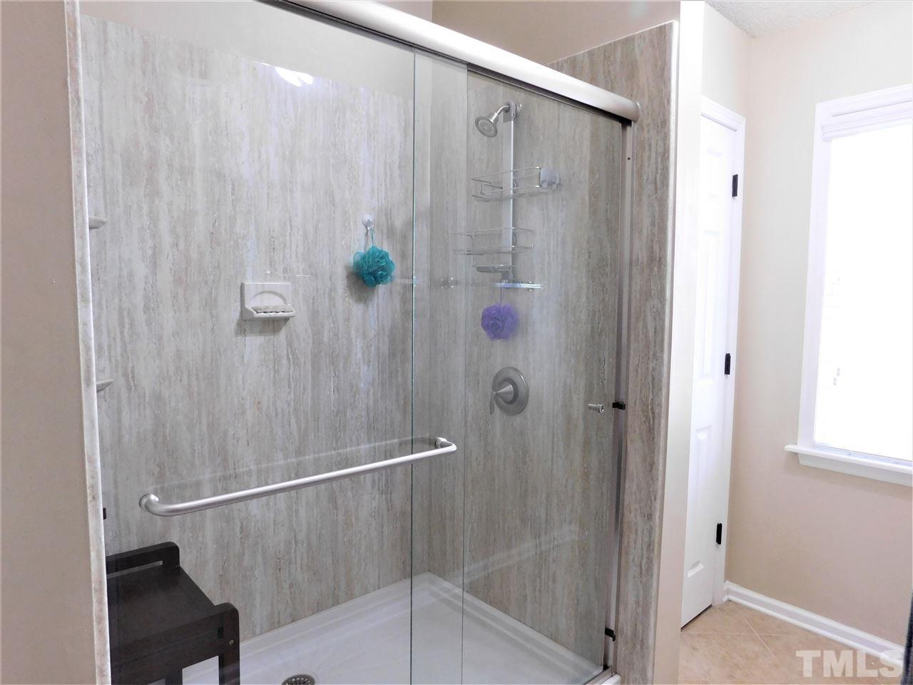 9420 Dawnshire Road Raleigh, NC 27615 - Photo 24 of 30 Good-Bye Garden Tub,Hello Walk In Shower! Updated and Ready to Enjoy!