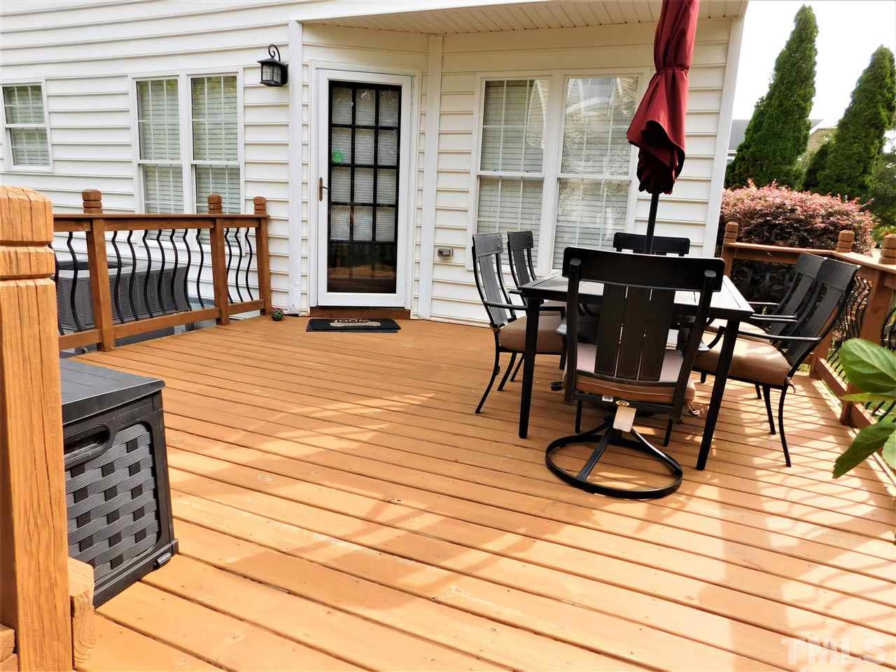 9420 Dawnshire Road Raleigh, NC 27615 - Photo 6 of 30 Freshly Stained deck with Metal Ballisters!