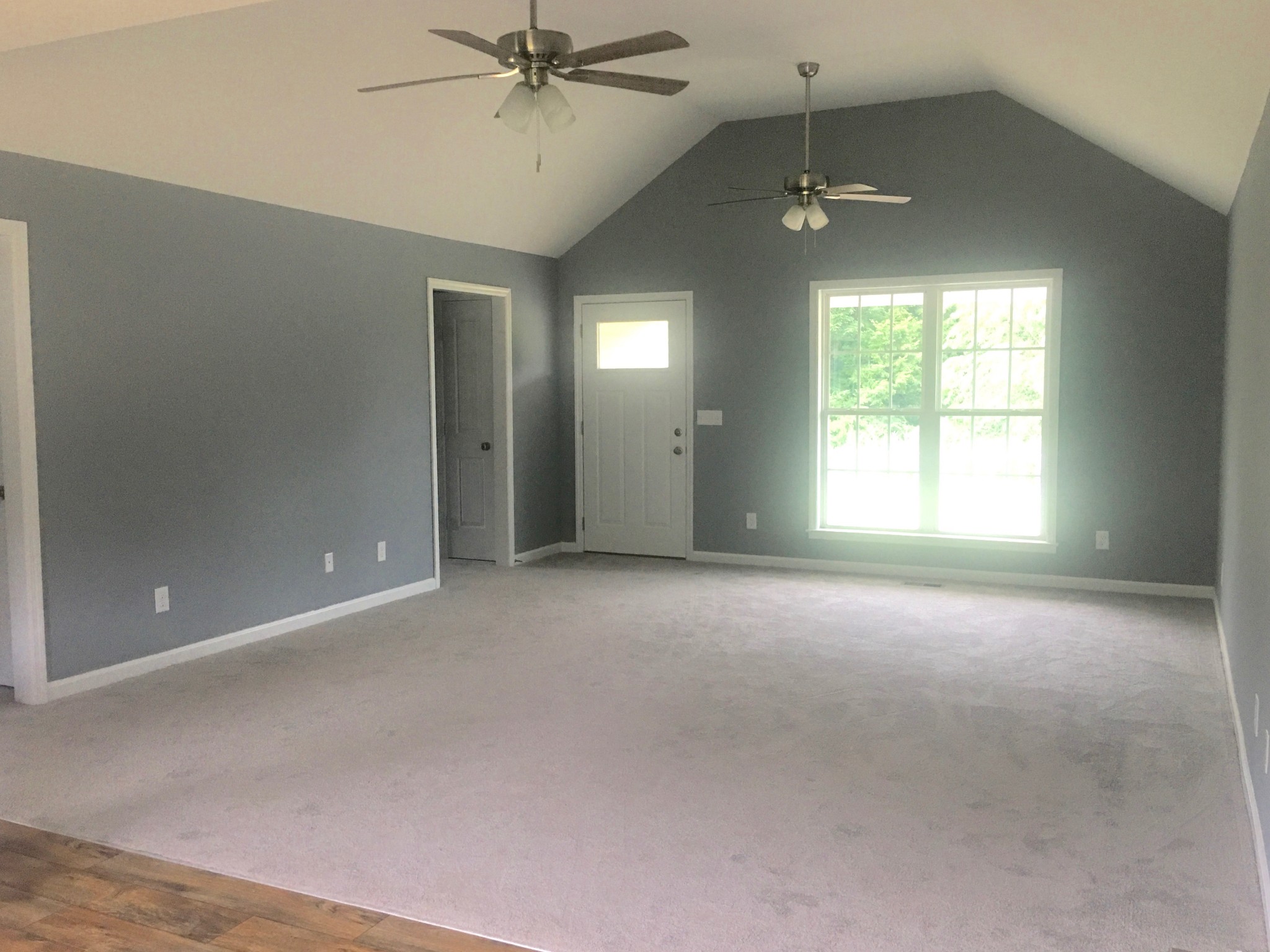 2281 Franklin Hayes Road Pulaski, TN 38478 - Photo 8 of 18 a view of a livingroom with a ceiling fan and window