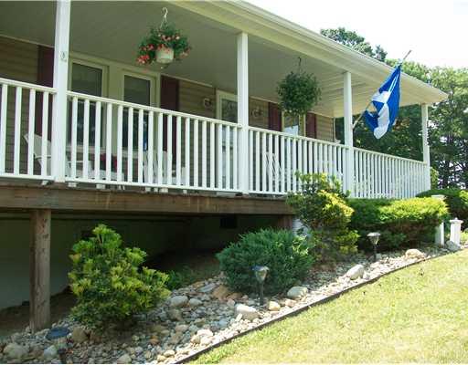 Exterior Front. Professionally landscaped