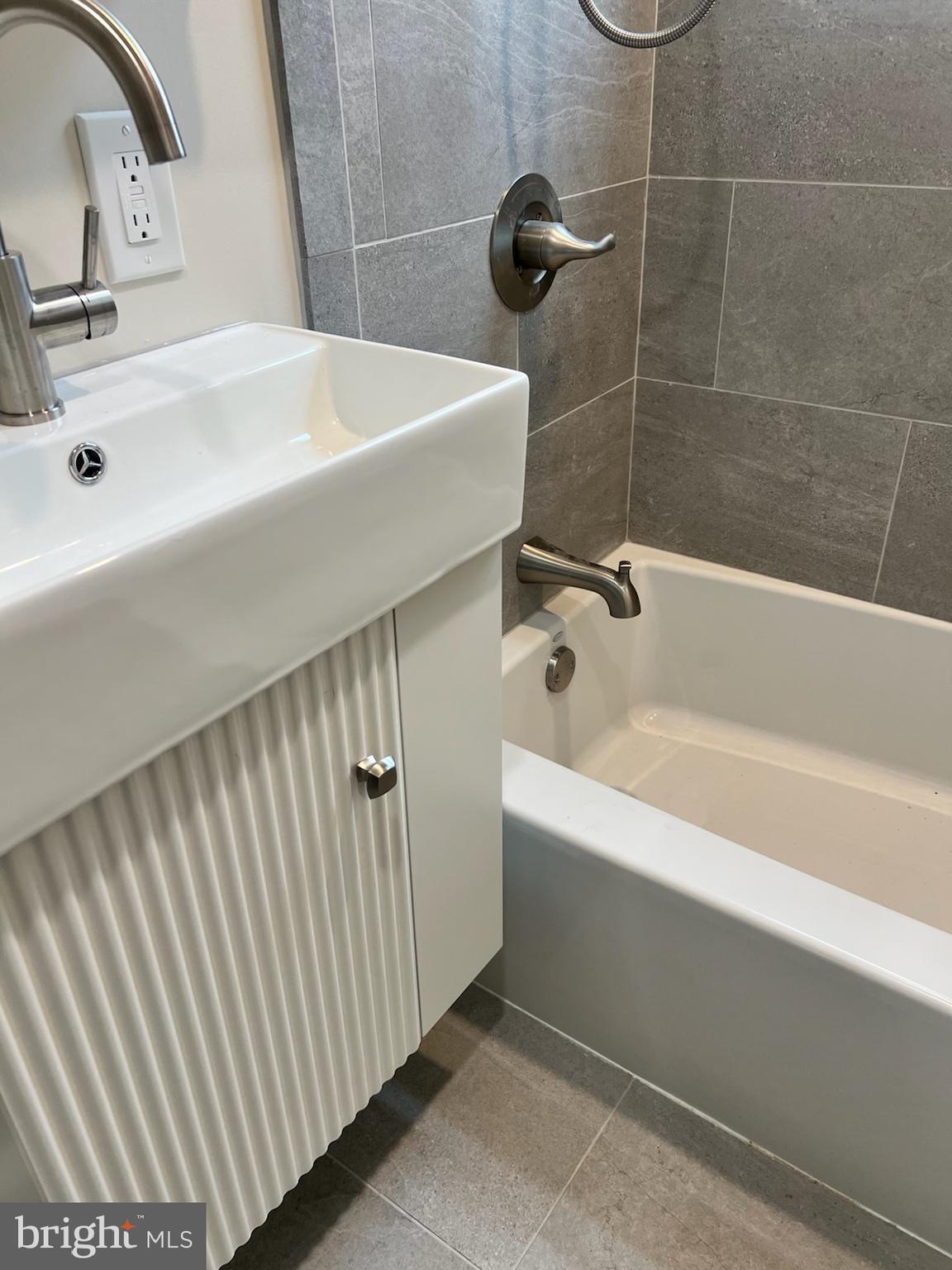 362 Ripka Street, Unit A Philadelphia, PA 19128 - Photo 11 of 18 a bathroom with a bathtub