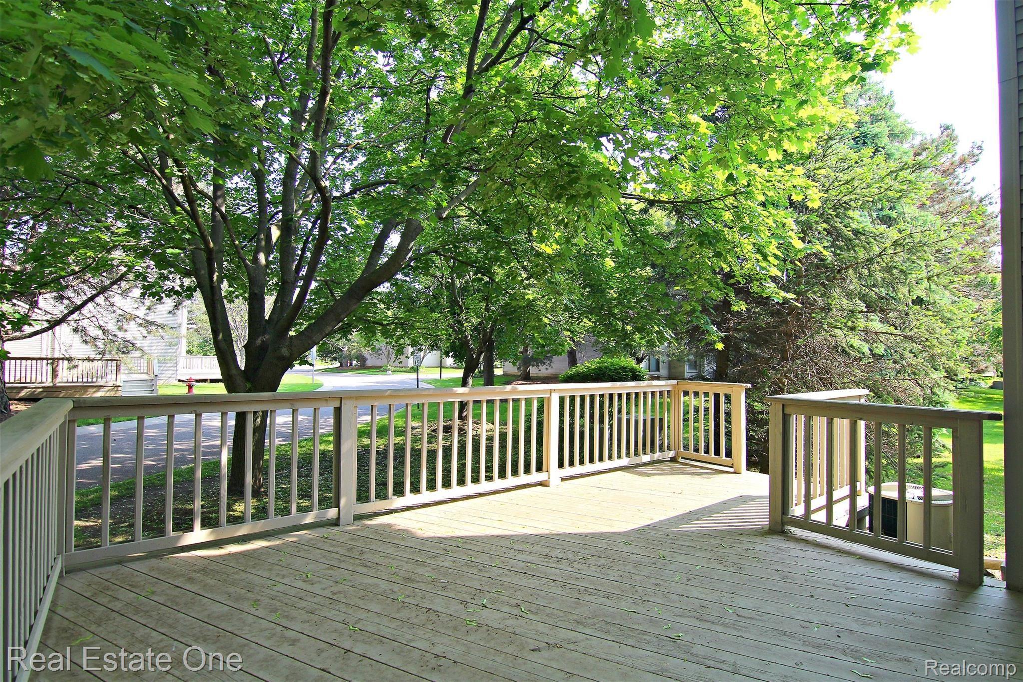 559 Harrow Court, Unit 39 Rochester, MI 48307 - Photo 19 of 19 jHarrow Ct Back Deck.jpg
