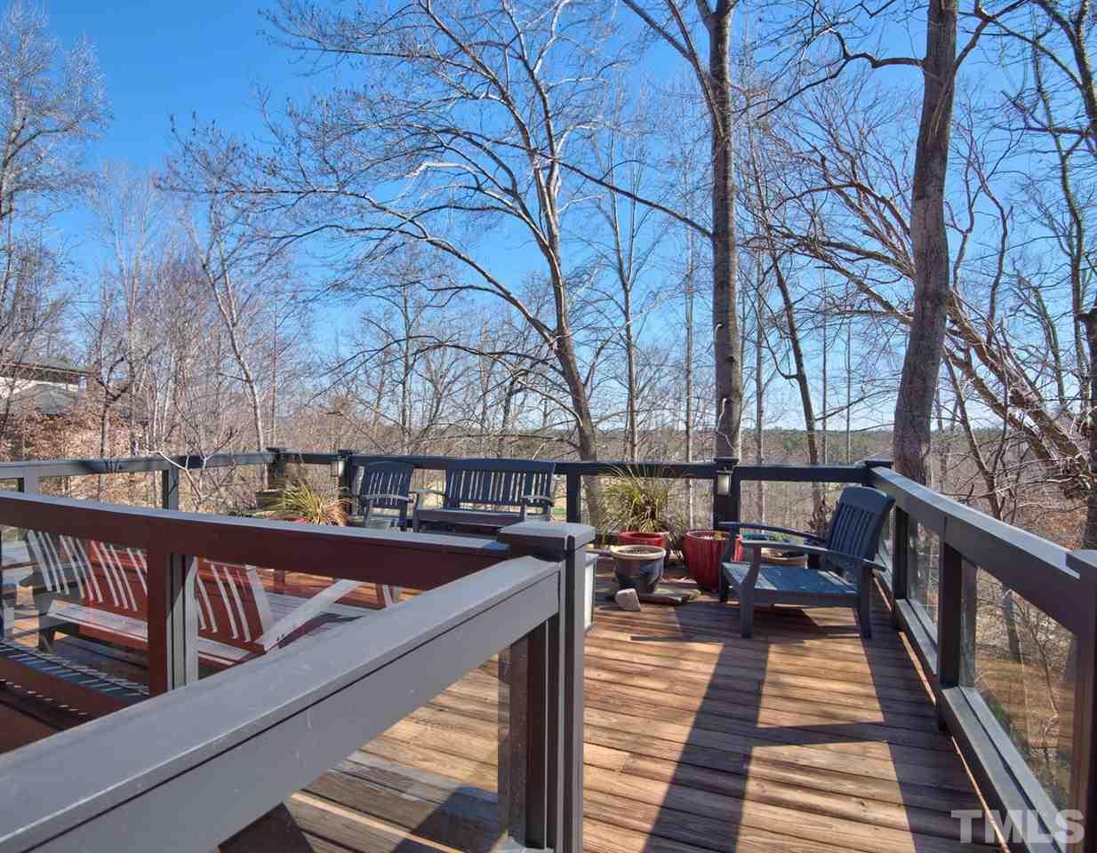 55219 Broughton Chapel Hill, NC 27517 - Photo 23 of 25 a view of a balcony with chairs