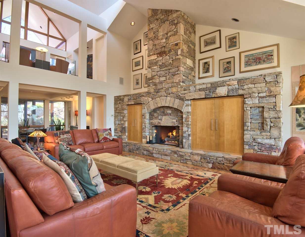 55219 Broughton Chapel Hill, NC 27517 - Photo 7 of 25 a living room with furniture fireplace and a fireplace
