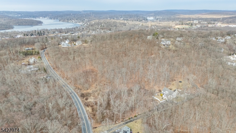 176 Espanong Road Lake Hopatcong, NJ 07849 - Photo 26 of 27 a view of a dry yard with wooden floor and mountain view