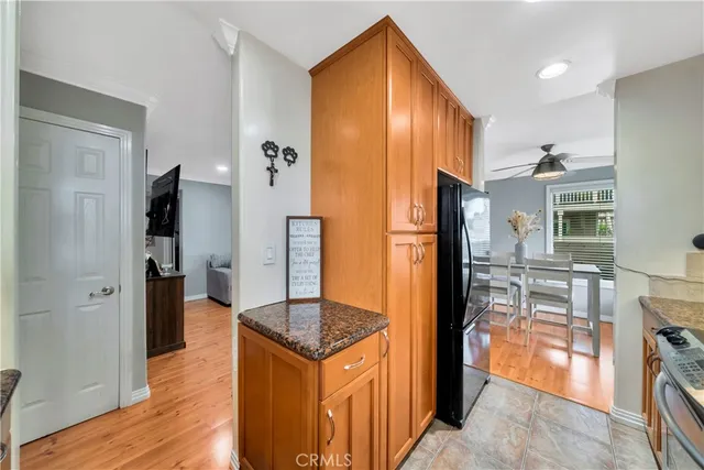 a view of a kitchen from the hallway