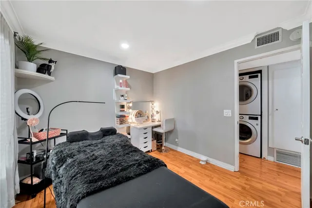 a bedroom with a bed and a table in it