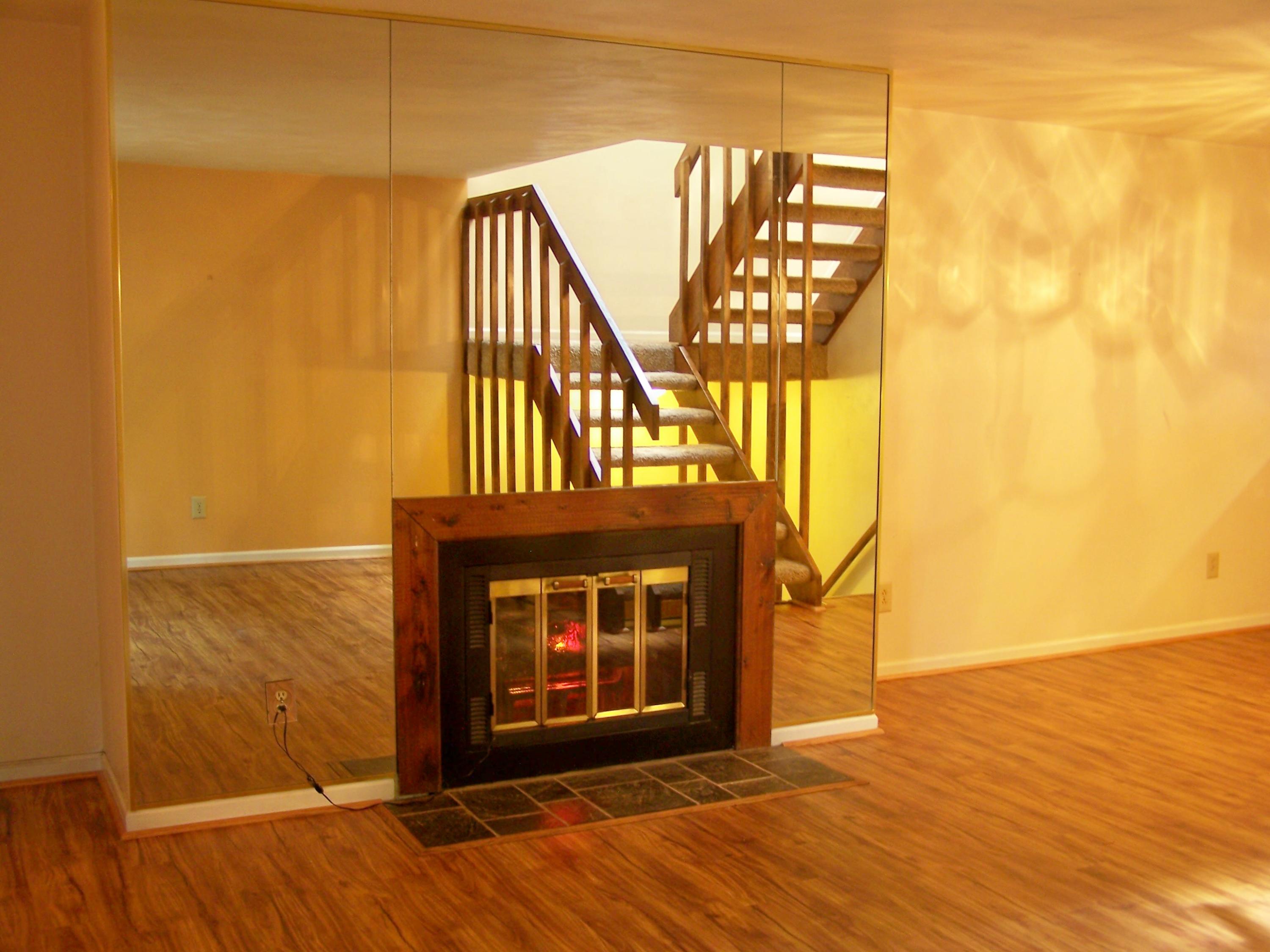 2912 Tree Swallow Road Roanoke, VA 24018 - Photo 5 of 32 a view of an empty room with wooden floor and a window