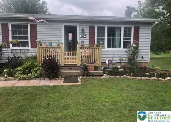 a house view with a garden space