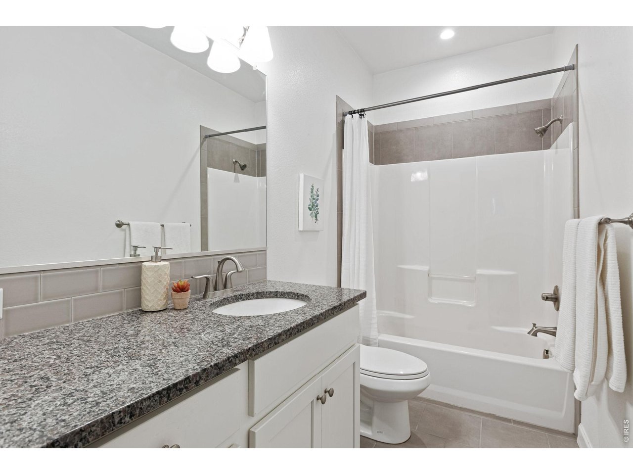 6511 19th Street Greeley, CO 80634 - Photo 15 of 26 Full Main Floor Bath